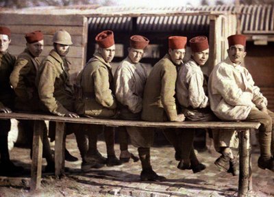 Group of Algerian soldiers following the retreat of the German army, Noyon, Oise, France, 1917 by Fernand Cuville